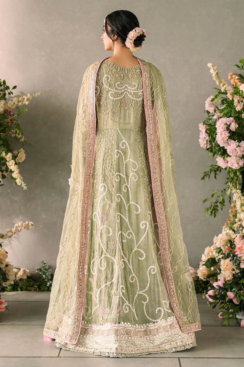 Model wearing Mushq Mastani Evening Luxury Chiffon Namar dress in a soft green shade, perfect for Pakistani wedding clothes online in the UK.