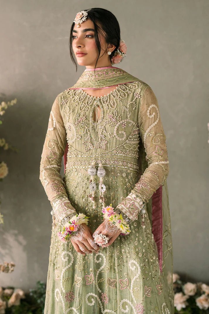 Model wearing Mushq Mastani Evening Luxury Chiffon Namar dress in a soft green shade, perfect for Pakistani wedding clothes online in the UK.