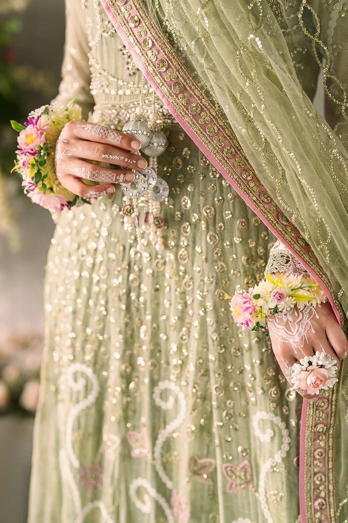 Model wearing Mushq Mastani Evening Luxury Chiffon Namar dress in a soft green shade, perfect for Pakistani wedding clothes online in the UK.