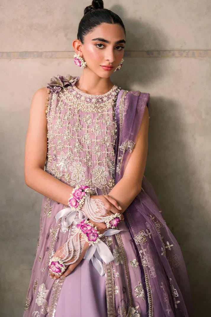 Model wearing Mushq Mastani Evening Luxury Chiffon Sana dress in soft lavender, perfect for Pakistani wedding clothes online in the UK.