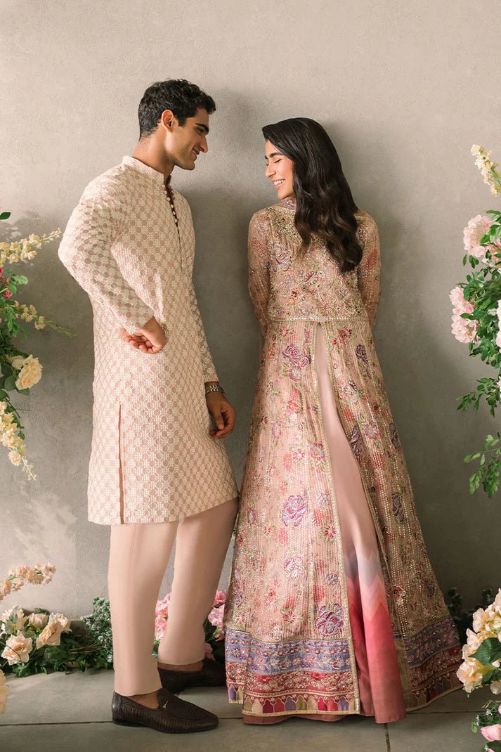 Model wearing Mushq Mastani Evening Luxury Chiffon Sona dress in peach, featuring intricate floral embroidery, ideal for Pakistani wedding clothes online in the UK.