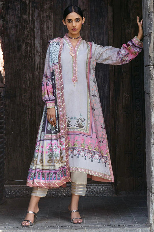 Model wearing Pewter dress from Mushq's Nirvana Silk Edit, featuring intricate floral prints in shades of pewter, pink, and grey. Pakistani winter casual pret clothes available online in the UK.