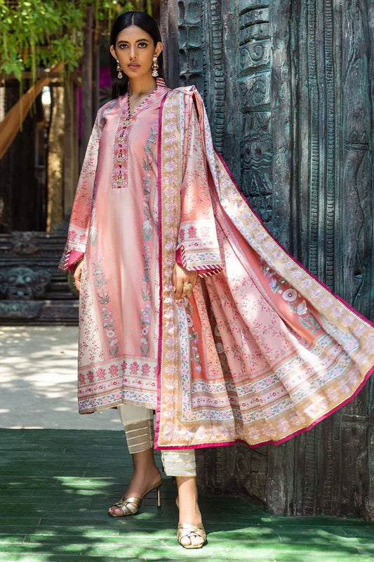 Model wearing Roseate dress from Mushq's Nirvana Silk Edit in soft pink with intricate floral designs. Pakistani winter casual pret clothes available online in the UK.