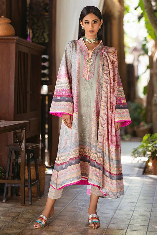 Model wearing Taffy dress from Mushq's Nirvana Silk Edit in pastel tones with intricate pink and grey patterns. Pakistani winter casual pret clothes available online in the UK.