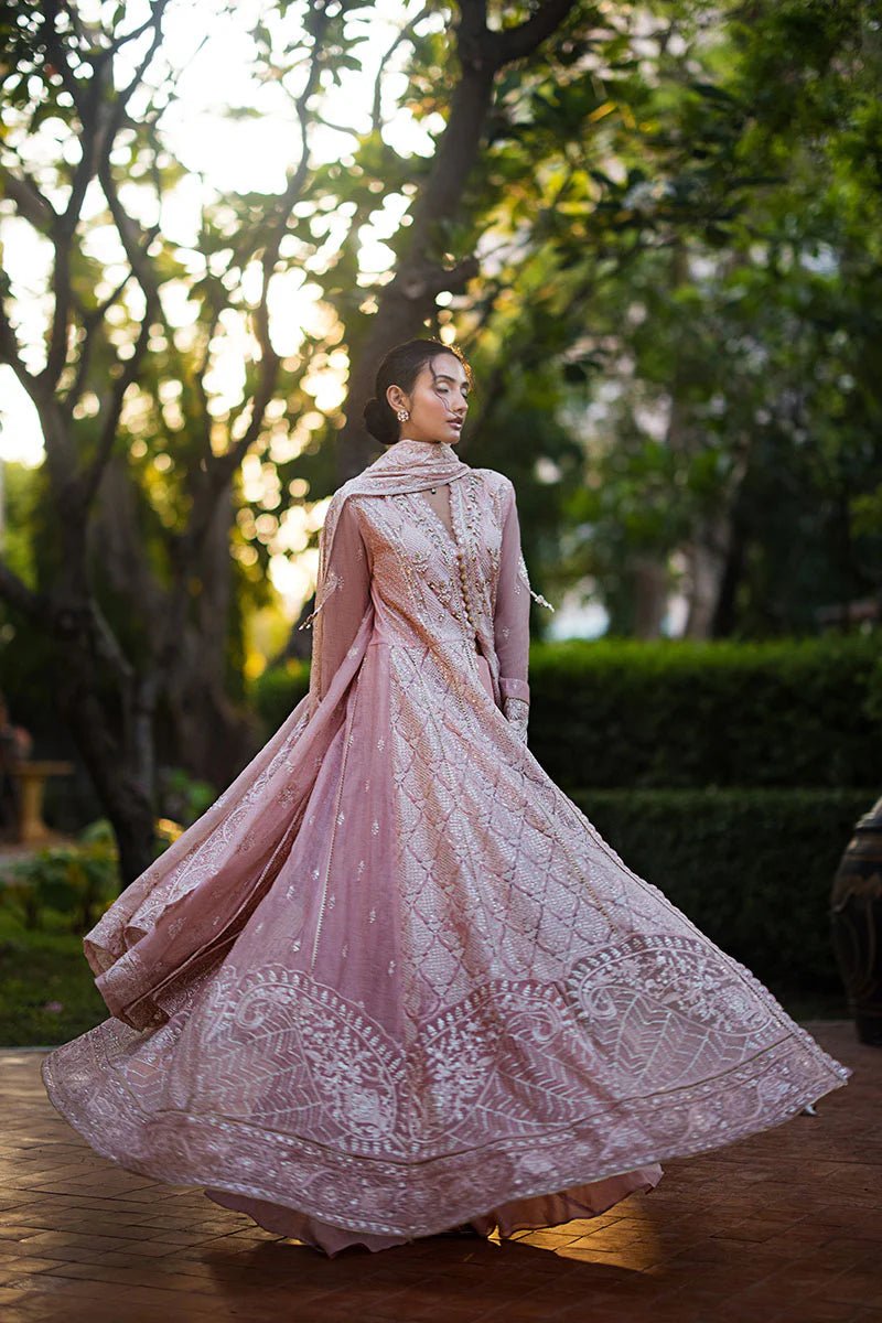 Model wearing Mushq Roohi Luxury Collection Aanya dress in blush pink, highlighting intricate embroidery. Perfect for Pakistani wedding clothes online in UK.