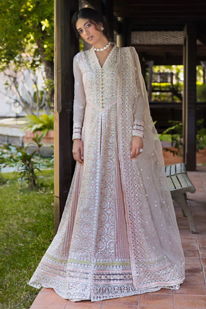 Model wearing a pale pink dress from Mushq's Roohi Luxury Collection, Anika. Perfect for Pakistani wedding clothes online in the UK.