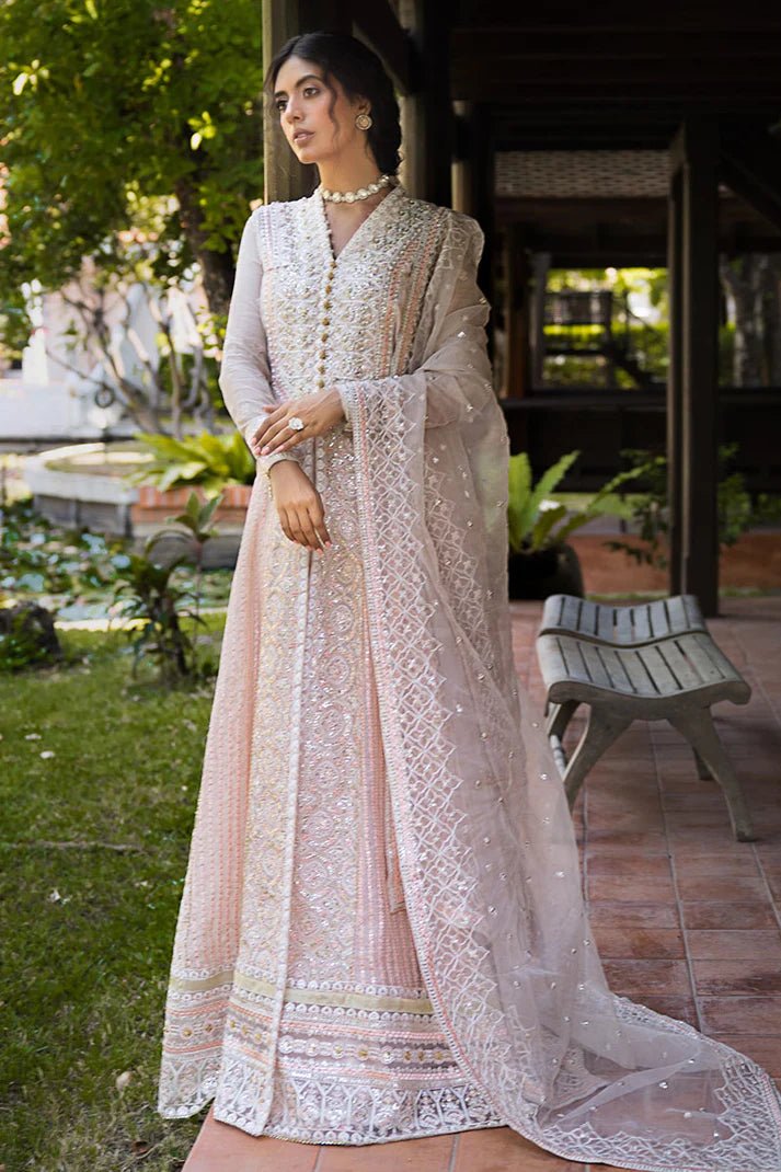 Model wearing a pale pink dress from Mushq's Roohi Luxury Collection, Anika. Perfect for Pakistani wedding clothes online in the UK.