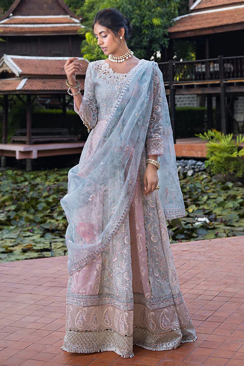 Model wearing Misha dress from Mushq, a pastel pink and blue outfit with intricate embroidery, perfect for Pakistani weddings. Available online in the UK.