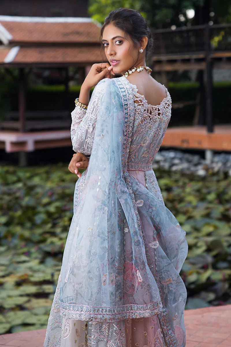 Model wearing Misha dress from Mushq, a pastel pink and blue outfit with intricate embroidery, perfect for Pakistani weddings. Available online in the UK.