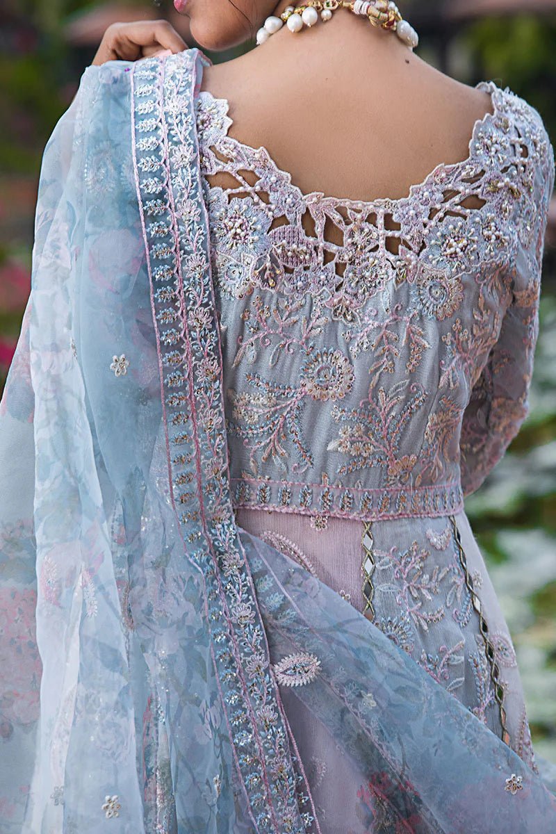 Model wearing Misha dress from Mushq, a pastel pink and blue outfit with intricate embroidery, perfect for Pakistani weddings. Available online in the UK.