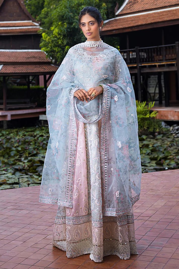 Model wearing Misha dress from Mushq, a pastel pink and blue outfit with intricate embroidery, perfect for Pakistani weddings. Available online in the UK.