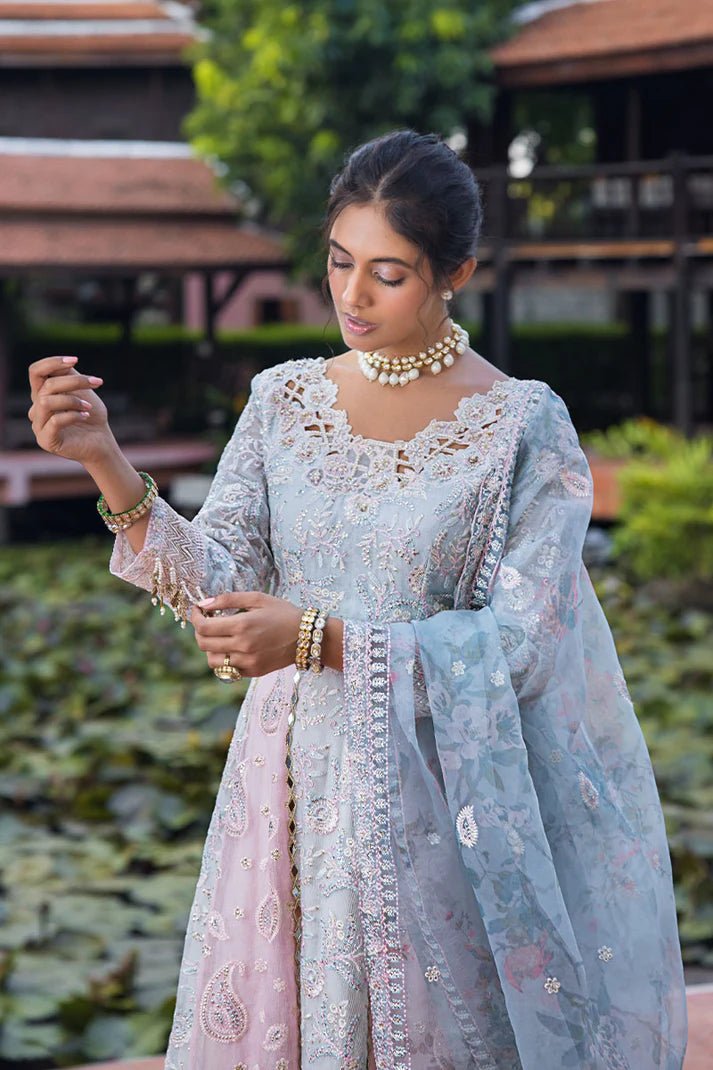 Model wearing Misha dress from Mushq, a pastel pink and blue outfit with intricate embroidery, perfect for Pakistani weddings. Available online in the UK.