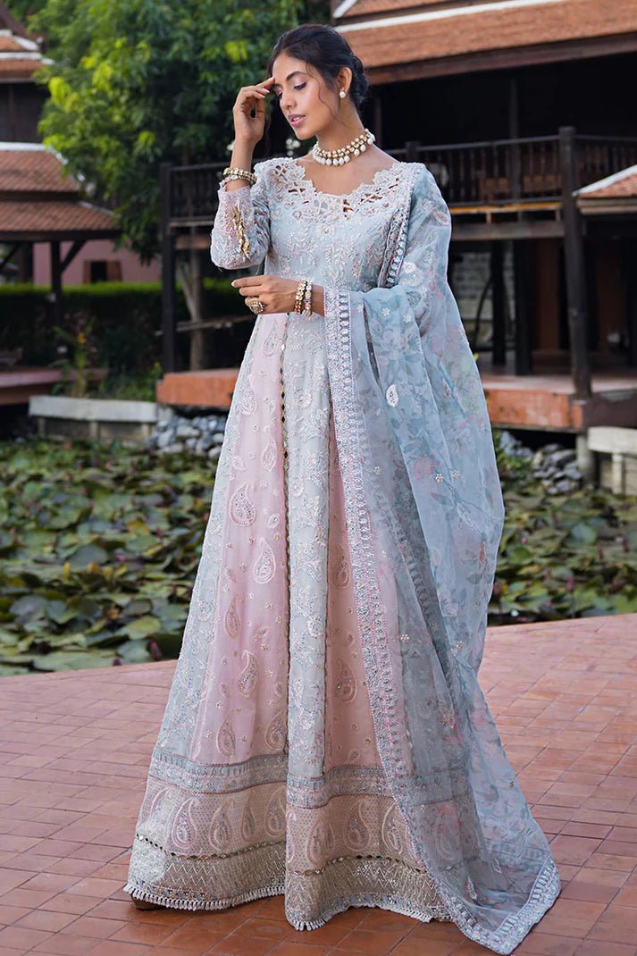 Model wearing Misha dress from Mushq, a pastel pink and blue outfit with intricate embroidery, perfect for Pakistani weddings. Available online in the UK.