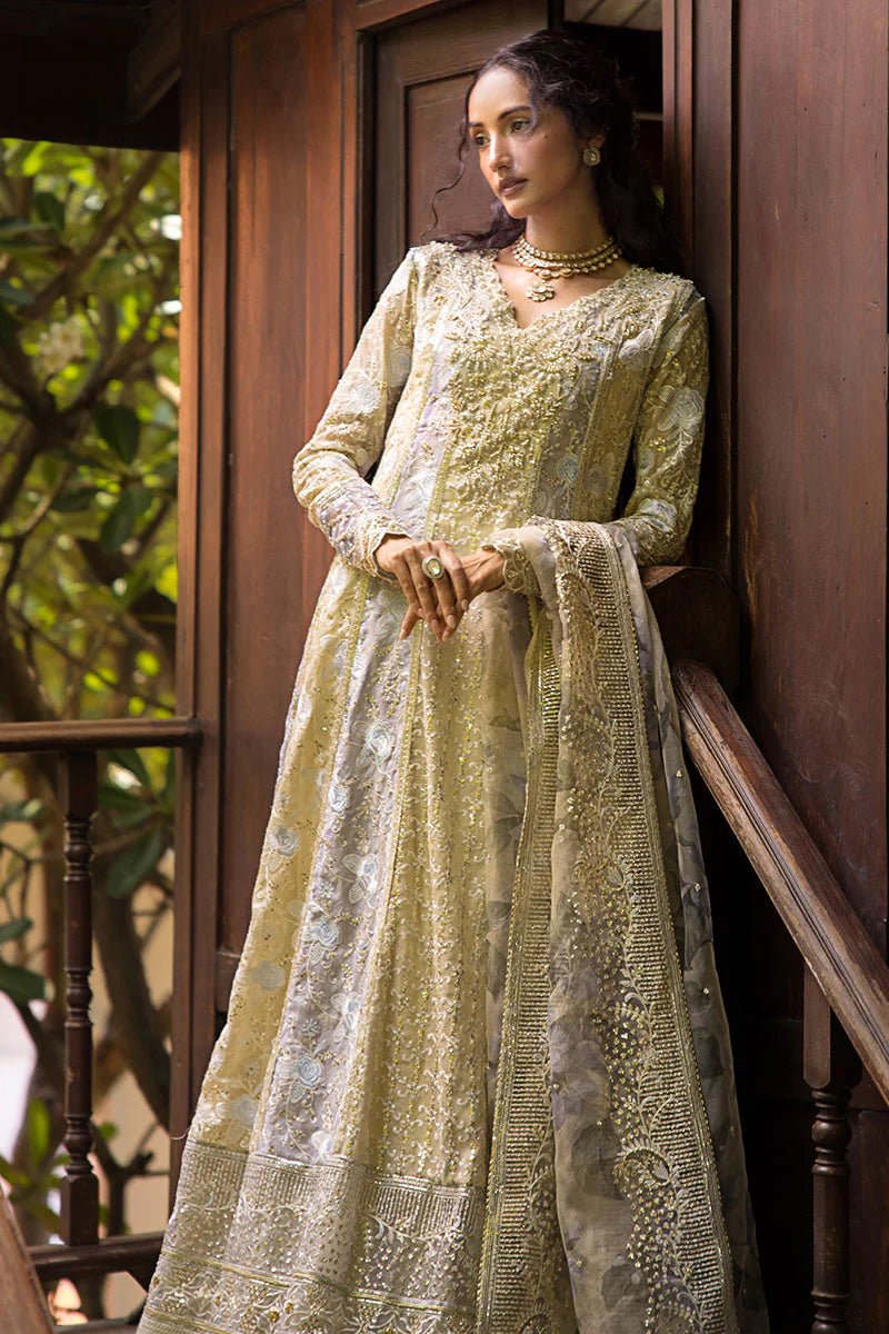 Model wearing pastel green Riya dress from Mushq Roohi Luxury Collection. Ideal for Pakistani clothes online in UK and wedding clothes shoppers.