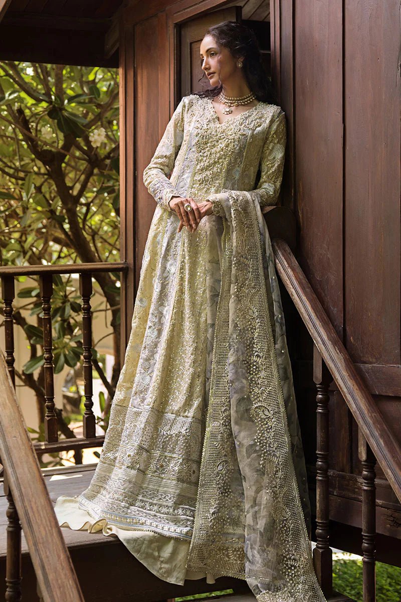 Model wearing pastel green Riya dress from Mushq Roohi Luxury Collection. Ideal for Pakistani clothes online in UK and wedding clothes shoppers.