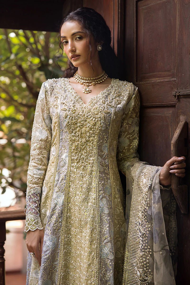 Model wearing pastel green Riya dress from Mushq Roohi Luxury Collection. Ideal for Pakistani clothes online in UK and wedding clothes shoppers.