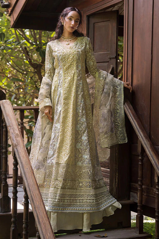 Model wearing pastel green Riya dress from Mushq Roohi Luxury Collection. Ideal for Pakistani clothes online in UK and wedding clothes shoppers.