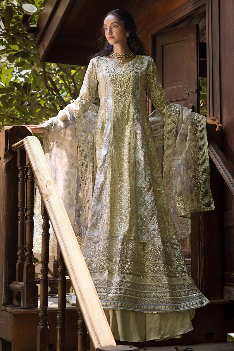 Model wearing pastel green Riya dress from Mushq Roohi Luxury Collection. Ideal for Pakistani clothes online in UK and wedding clothes shoppers.