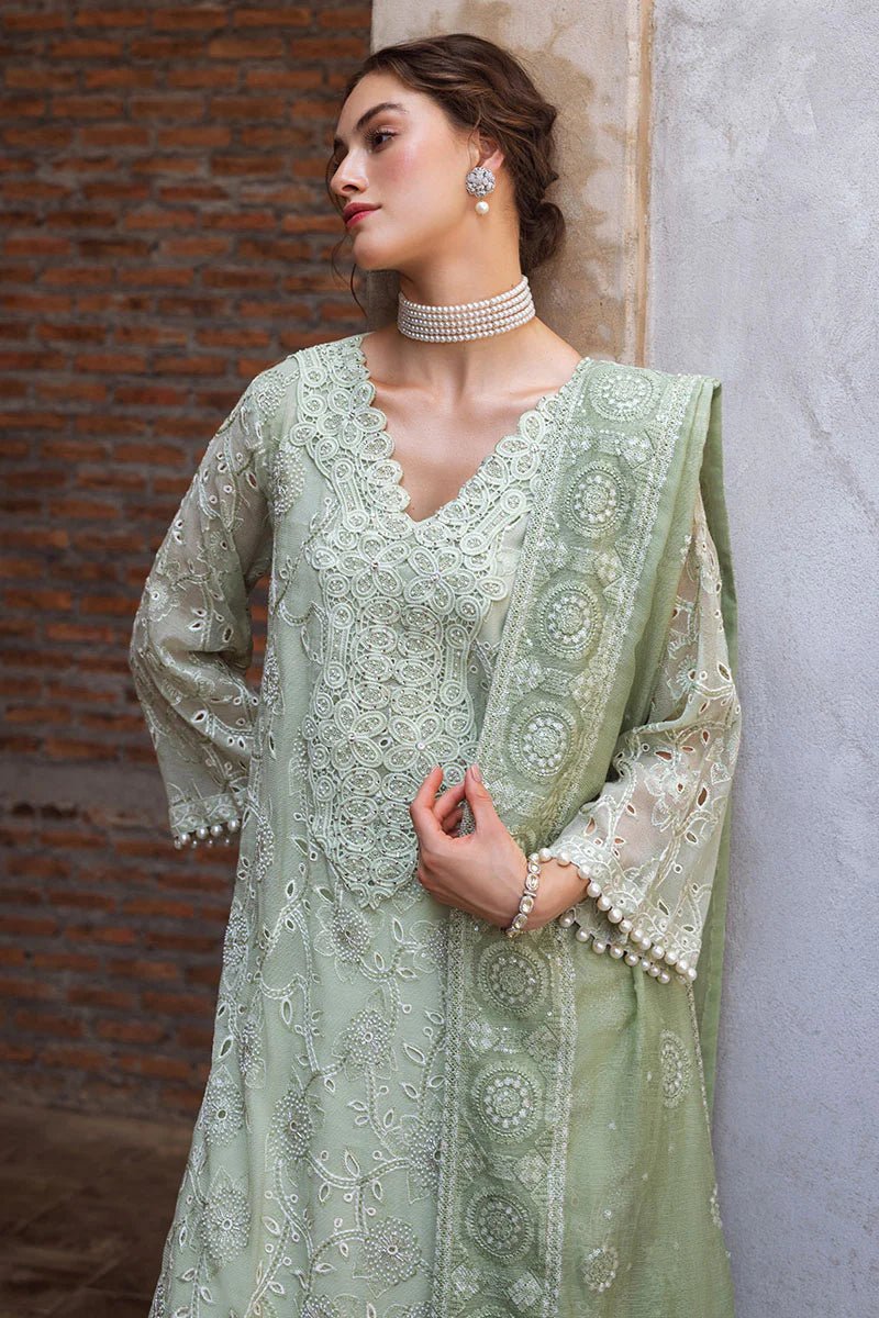 Model wearing Dhara dress from Mushq's Saugaat Chickenkari Pret collection. Pakistani clothes online in the UK at Signature Labels.