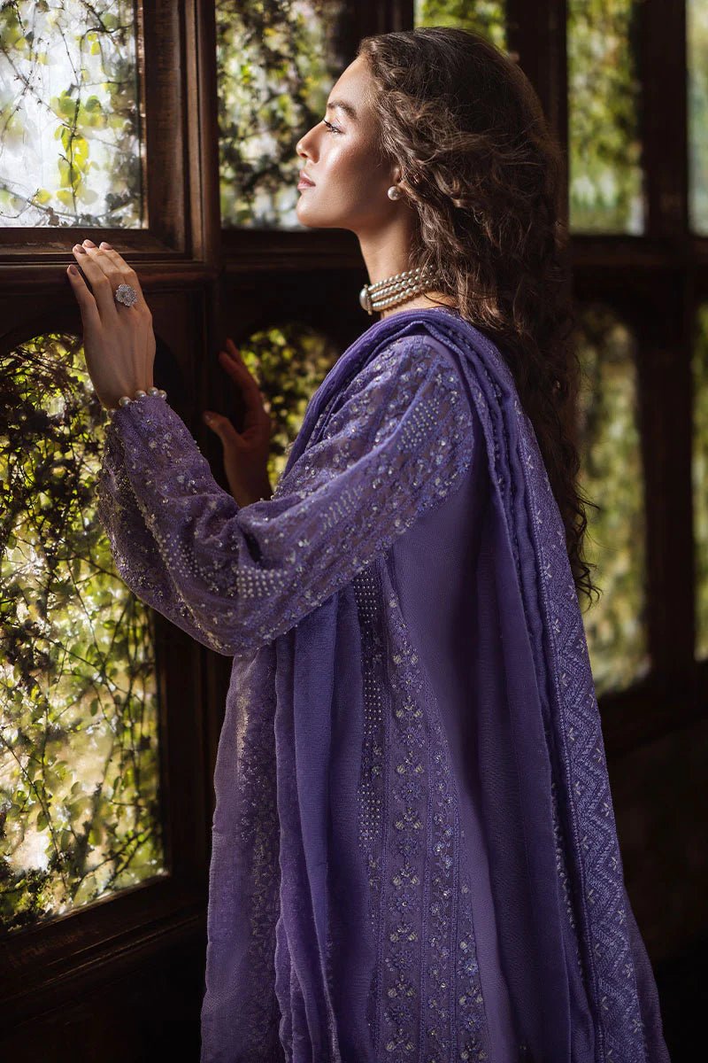 Model wearing lavender LALEH dress from Mushq, Saugaat Chickenkari Pret collection. Pakistani designer clothes in UK, readymade clothes, elegant and stylish.