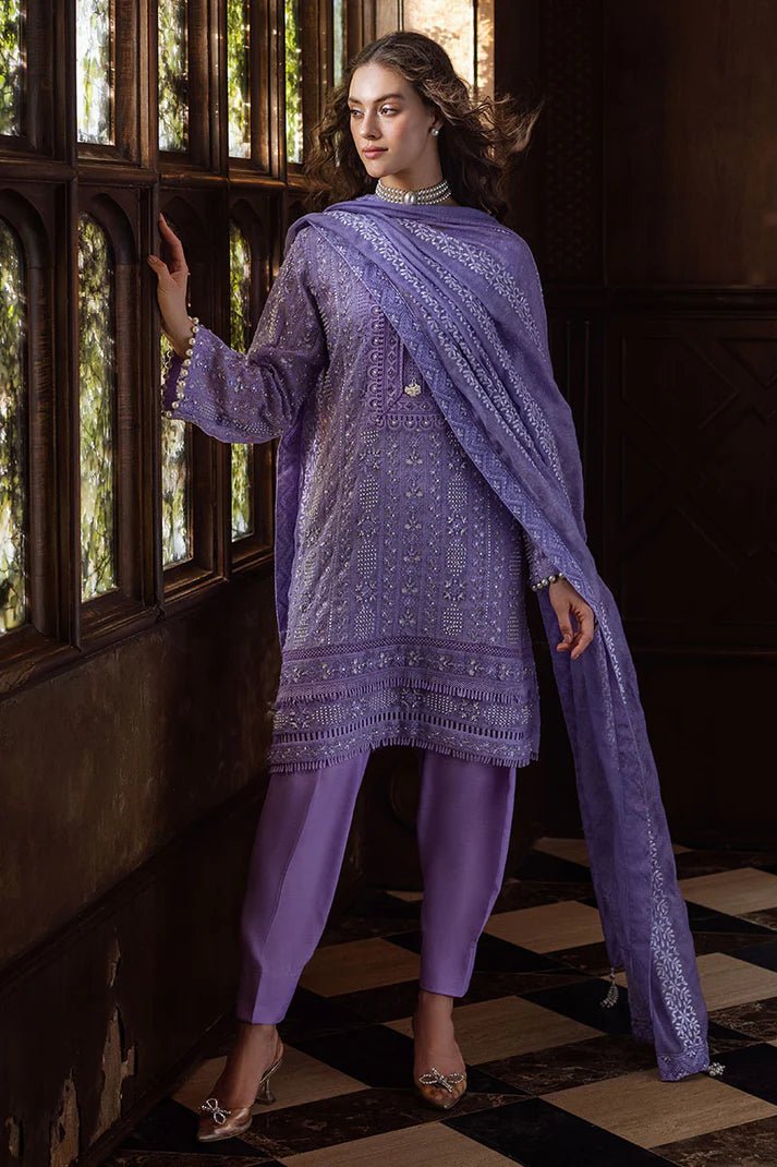 Model wearing lavender LALEH dress from Mushq, Saugaat Chickenkari Pret collection. Pakistani designer clothes in UK, readymade clothes, elegant and stylish.