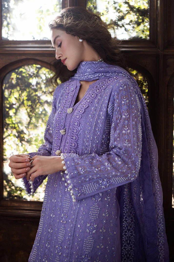 Model wearing lavender LALEH dress from Mushq, Saugaat Chickenkari Pret collection. Pakistani designer clothes in UK, readymade clothes, elegant and stylish.