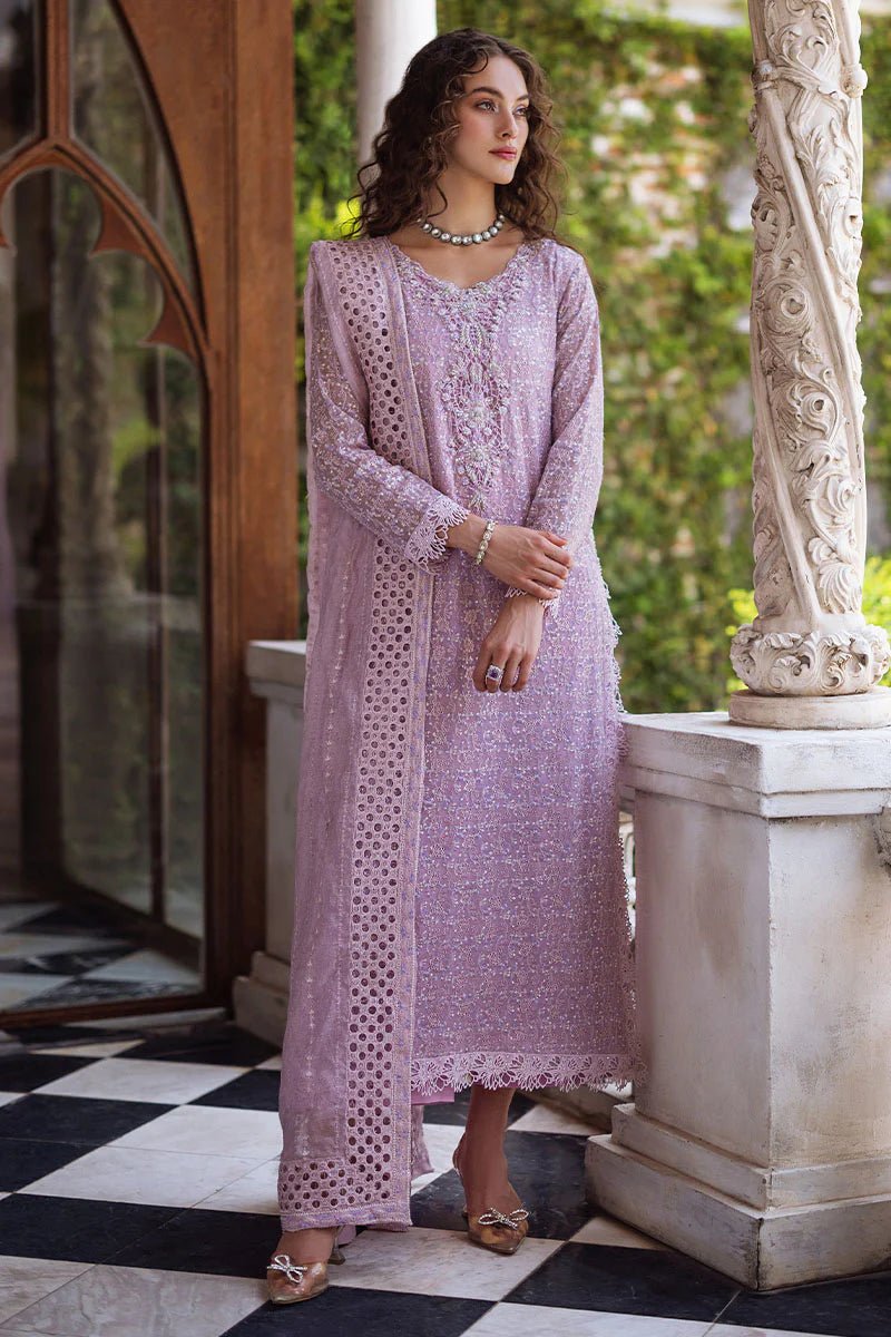 Model wearing a pastel pink Shirin dress from Mushq, Saugaat Chickenkari Pret collection. Pakistani designer clothes in UK, readymade clothes, elegant and stylish.