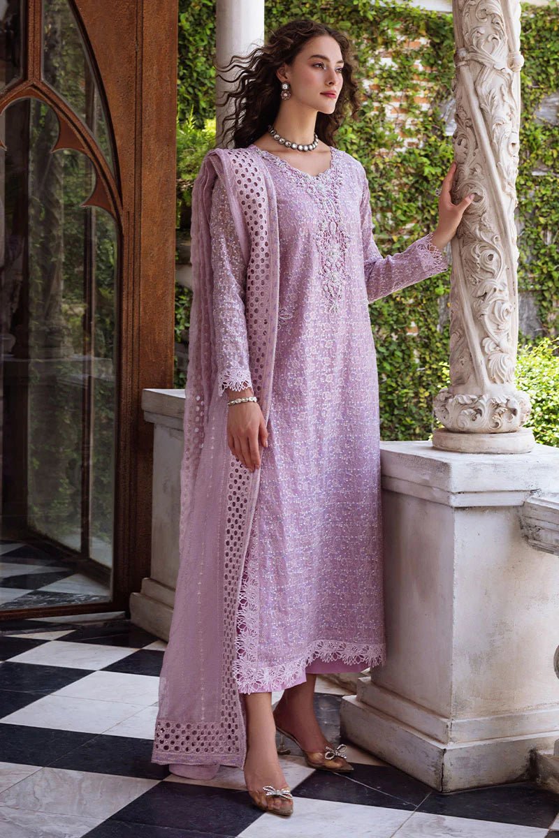 Model wearing Shirin dress from Mushq's Saugaat Chickenkari Pret collection. Pakistani clothes online in the UK at Signature Labels.