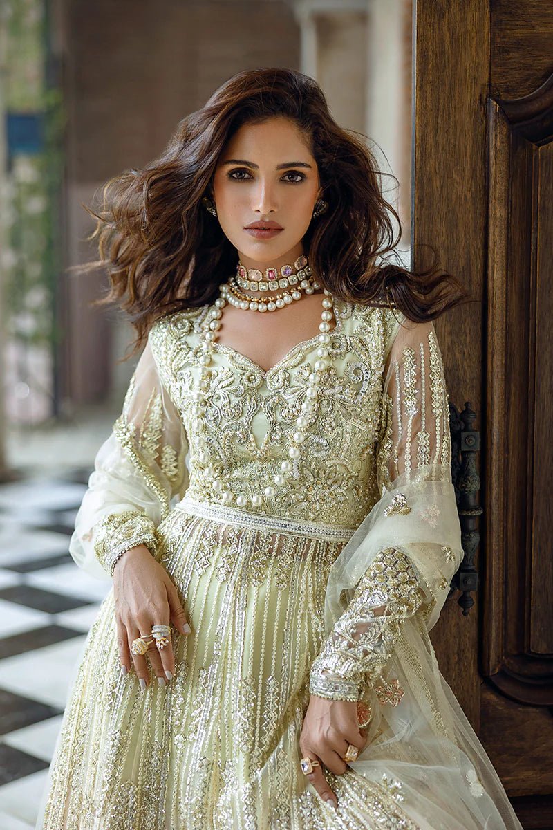 Model wearing Cosmic Couture from Mushq's Stardust Wedding Collection '24, featuring luxurious details. Pakistani clothes online in UK.