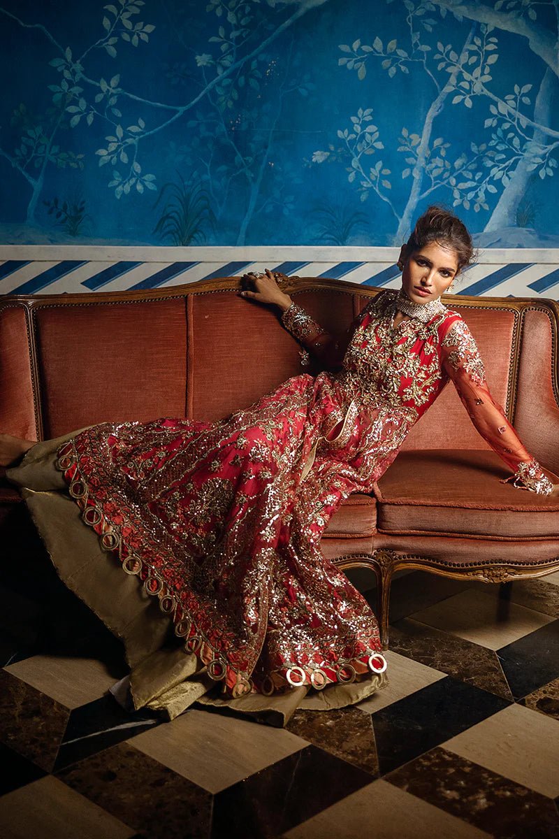 Model wearing Red Carpet from Mushq's Stardust Wedding Collection '24, featuring luxurious design and detailing. Pakistani clothes online in UK.