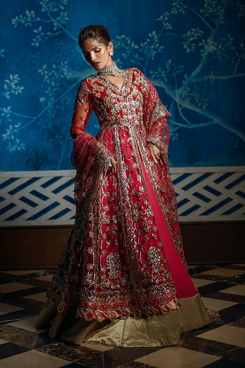 Model wearing Red Carpet from Mushq's Stardust Wedding Collection '24, featuring luxurious design and detailing. Pakistani clothes online in UK.