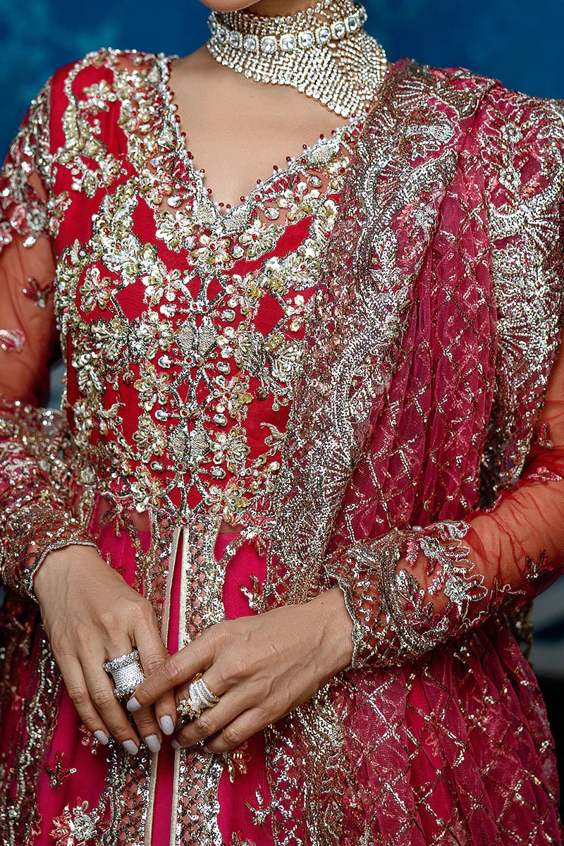 Model wearing Red Carpet from Mushq's Stardust Wedding Collection '24, featuring luxurious design and detailing. Pakistani clothes online in UK.