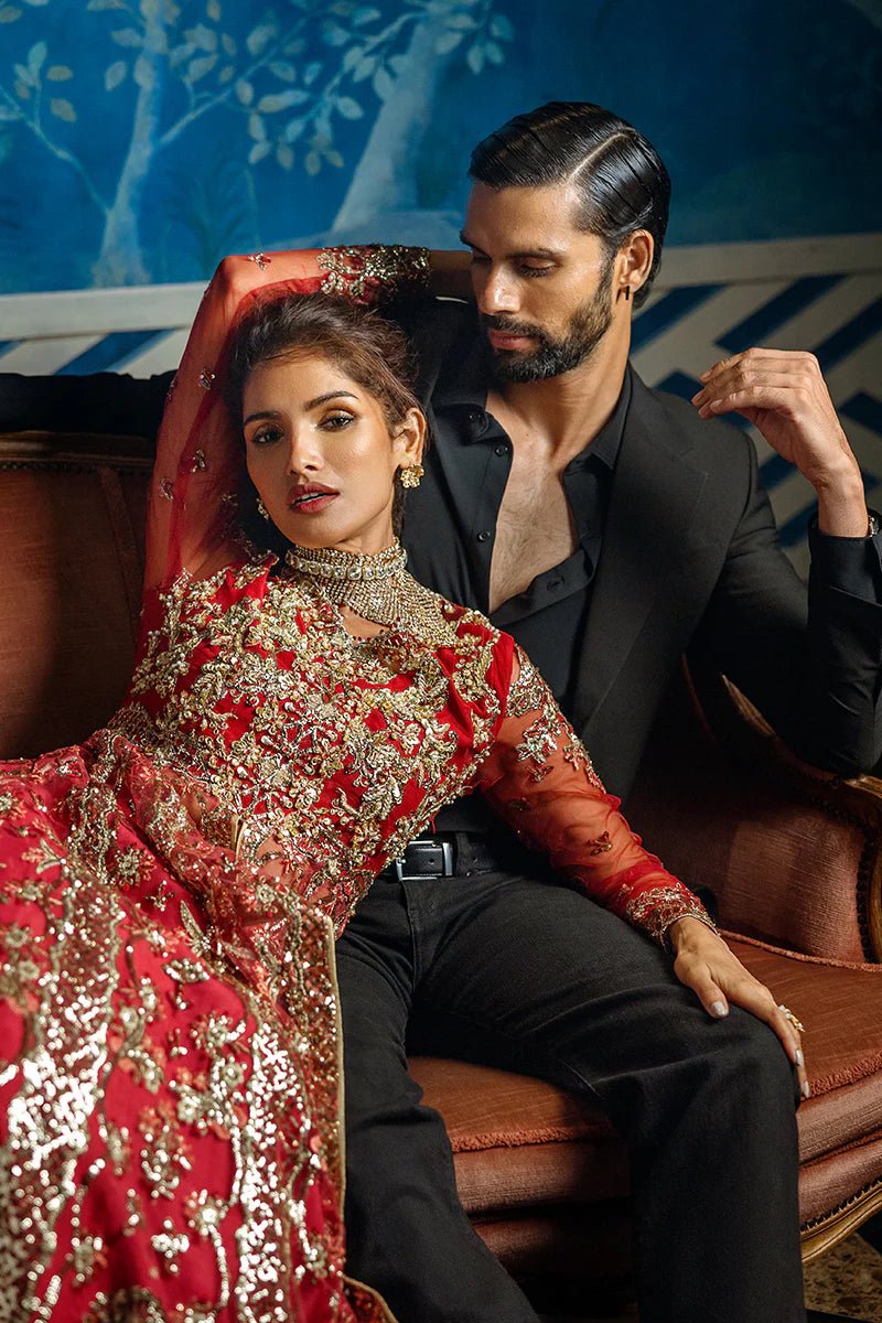 Model wearing Red Carpet from Mushq's Stardust Wedding Collection '24, featuring luxurious design and detailing. Pakistani clothes online in UK.