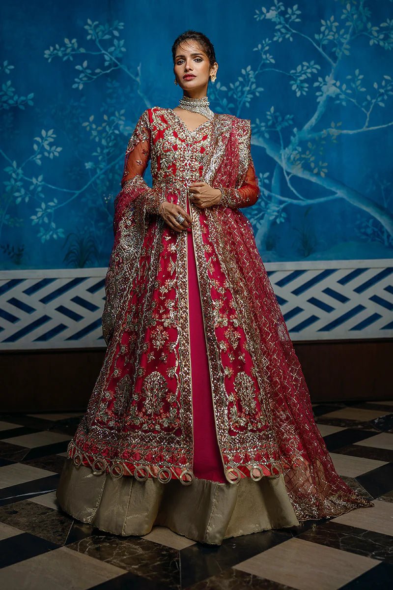 Model wearing Red Carpet from Mushq's Stardust Wedding Collection '24, featuring luxurious design and detailing. Pakistani clothes online in UK.