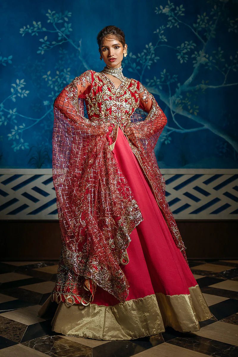 Model wearing Red Carpet from Mushq's Stardust Wedding Collection '24, featuring luxurious design and detailing. Pakistani clothes online in UK.