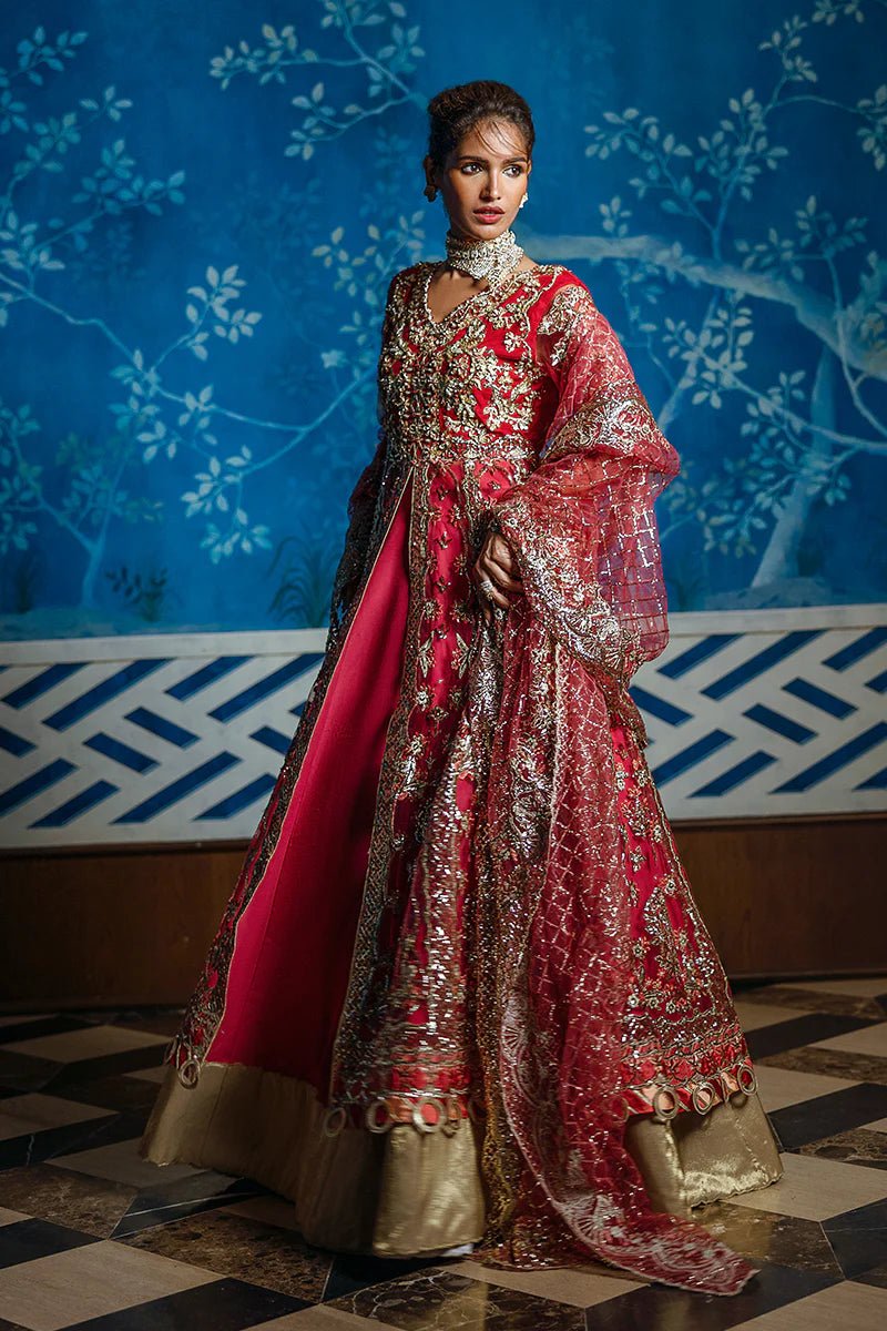 Model wearing Red Carpet from Mushq's Stardust Wedding Collection '24, featuring luxurious design and detailing. Pakistani clothes online in UK.