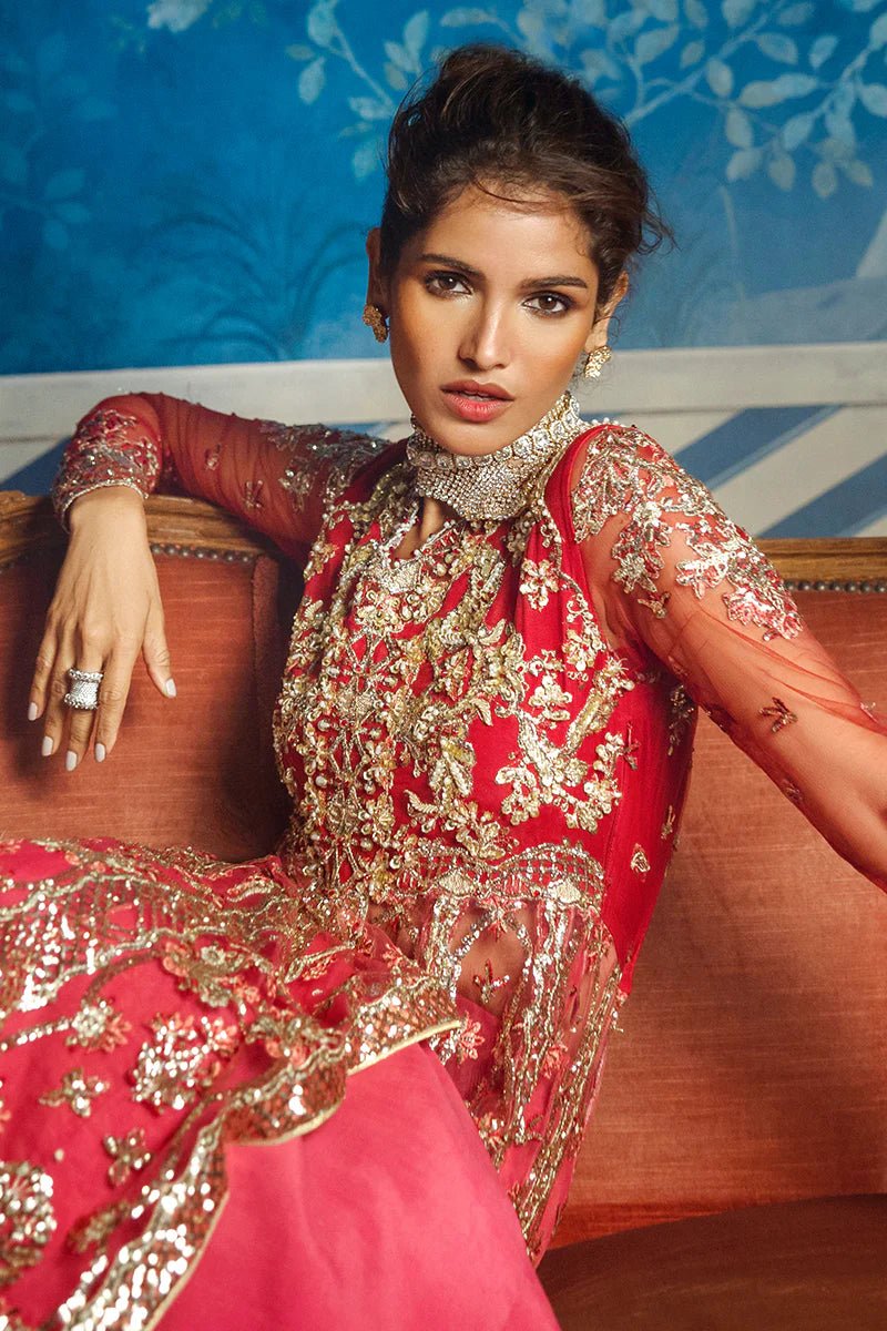 Model wearing Red Carpet from Mushq's Stardust Wedding Collection '24, featuring luxurious design and detailing. Pakistani clothes online in UK.