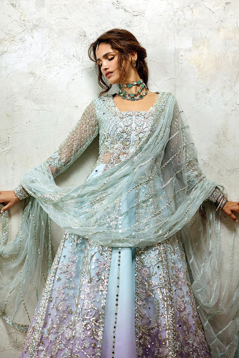 Model wearing Silver Screen from Mushq's Stardust Wedding Collection '24, featuring intricate details and elegant design. Pakistani clothes online in UK.