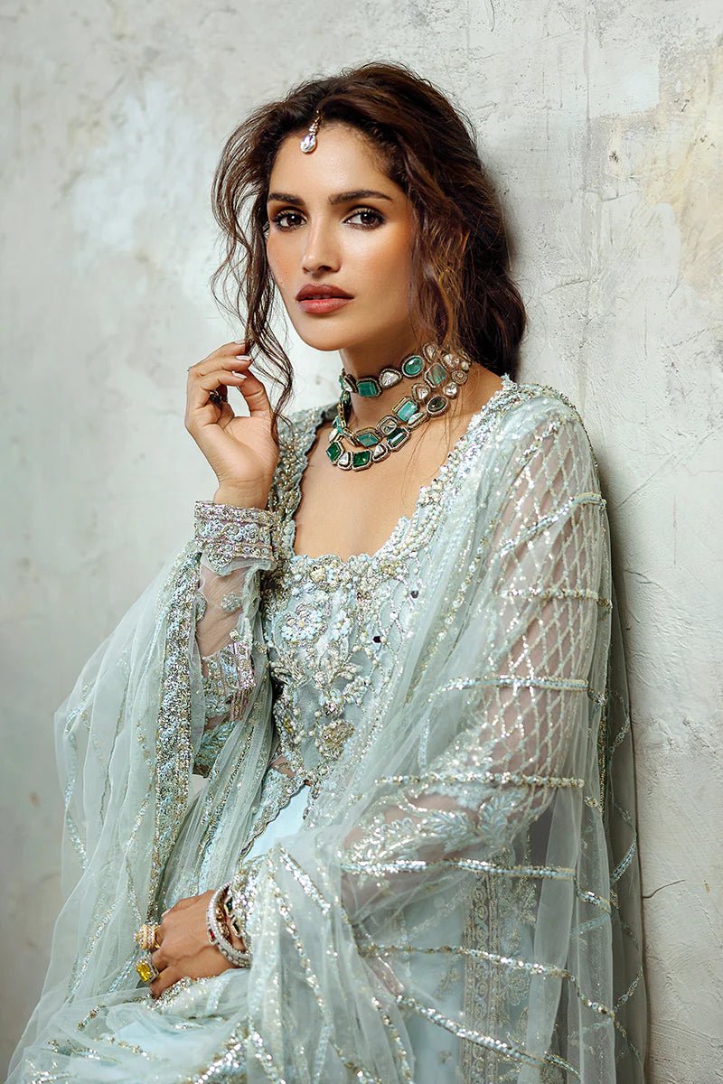 Model wearing Silver Screen from Mushq's Stardust Wedding Collection '24, featuring intricate details and elegant design. Pakistani clothes online in UK.