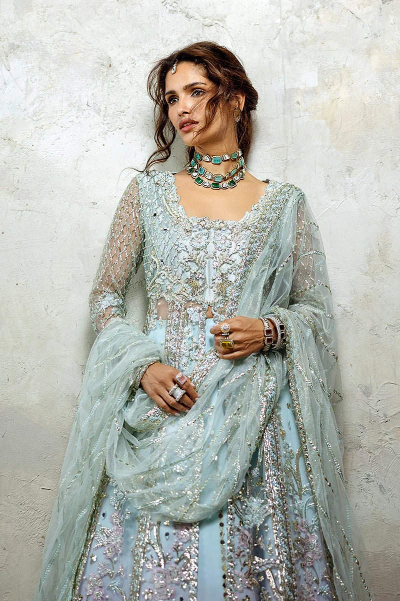 Model wearing Silver Screen from Mushq's Stardust Wedding Collection '24, featuring intricate details and elegant design. Pakistani clothes online in UK.