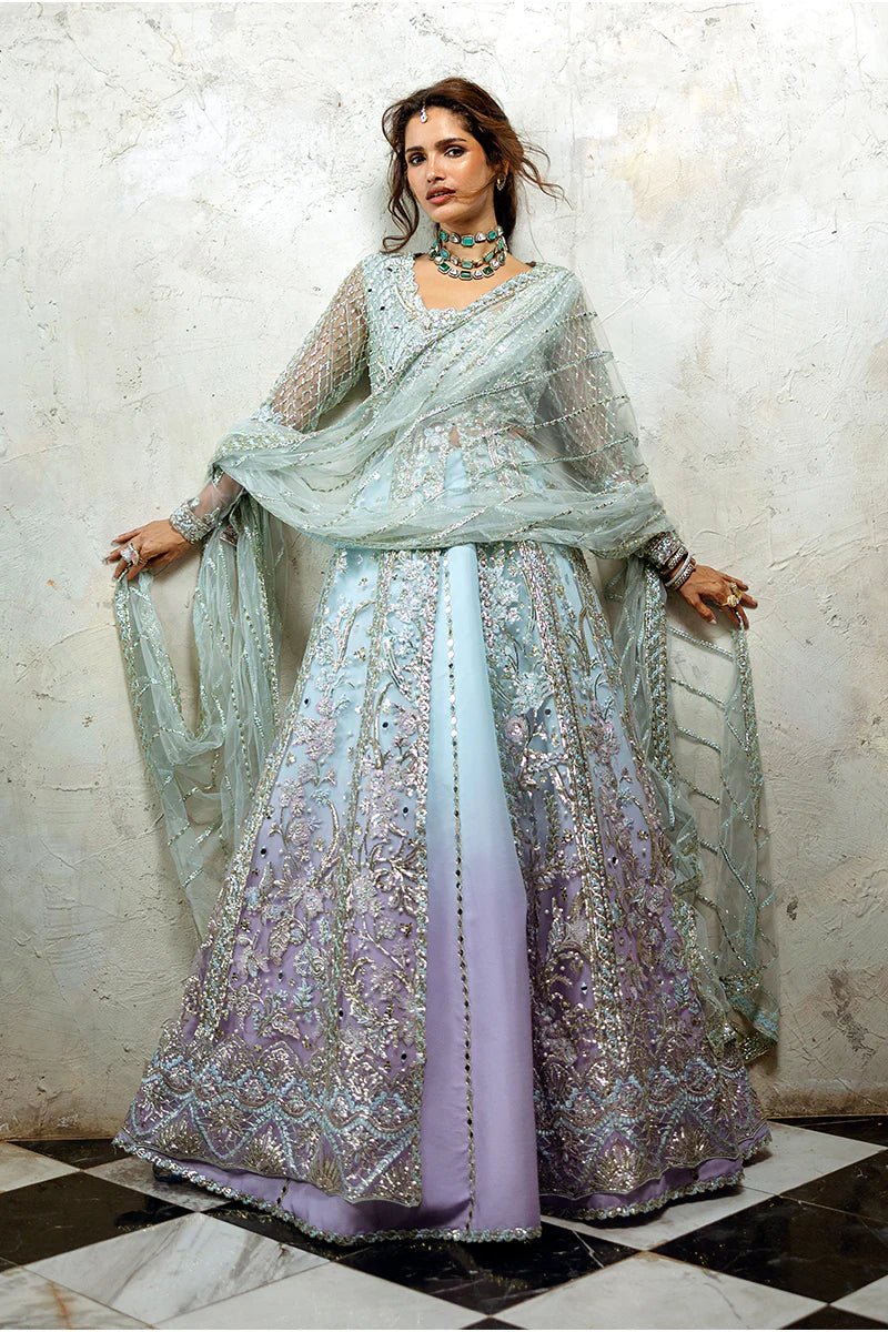 Model wearing Silver Screen from Mushq's Stardust Wedding Collection '24, featuring intricate details and elegant design. Pakistani clothes online in UK.