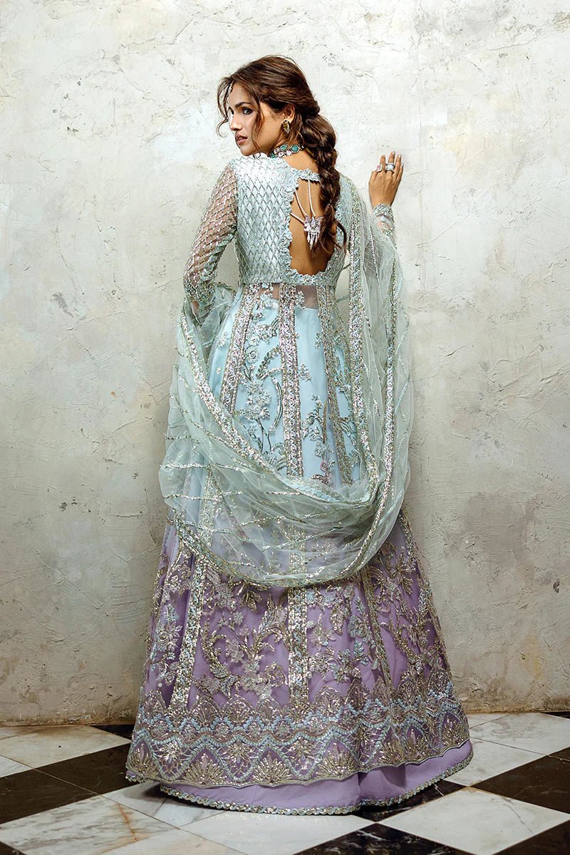 Model wearing Silver Screen from Mushq's Stardust Wedding Collection '24, featuring intricate details and elegant design. Pakistani clothes online in UK.