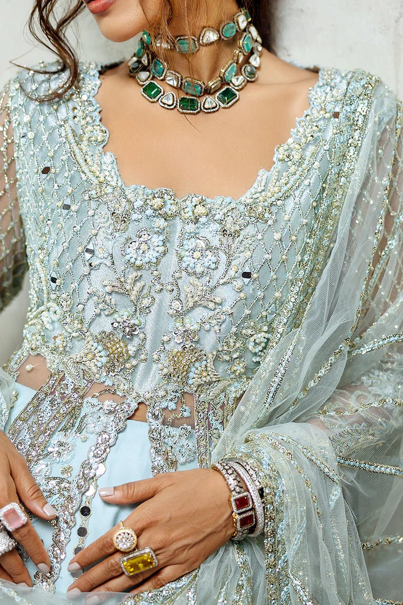 Model wearing Silver Screen from Mushq's Stardust Wedding Collection '24, featuring intricate details and elegant design. Pakistani clothes online in UK.