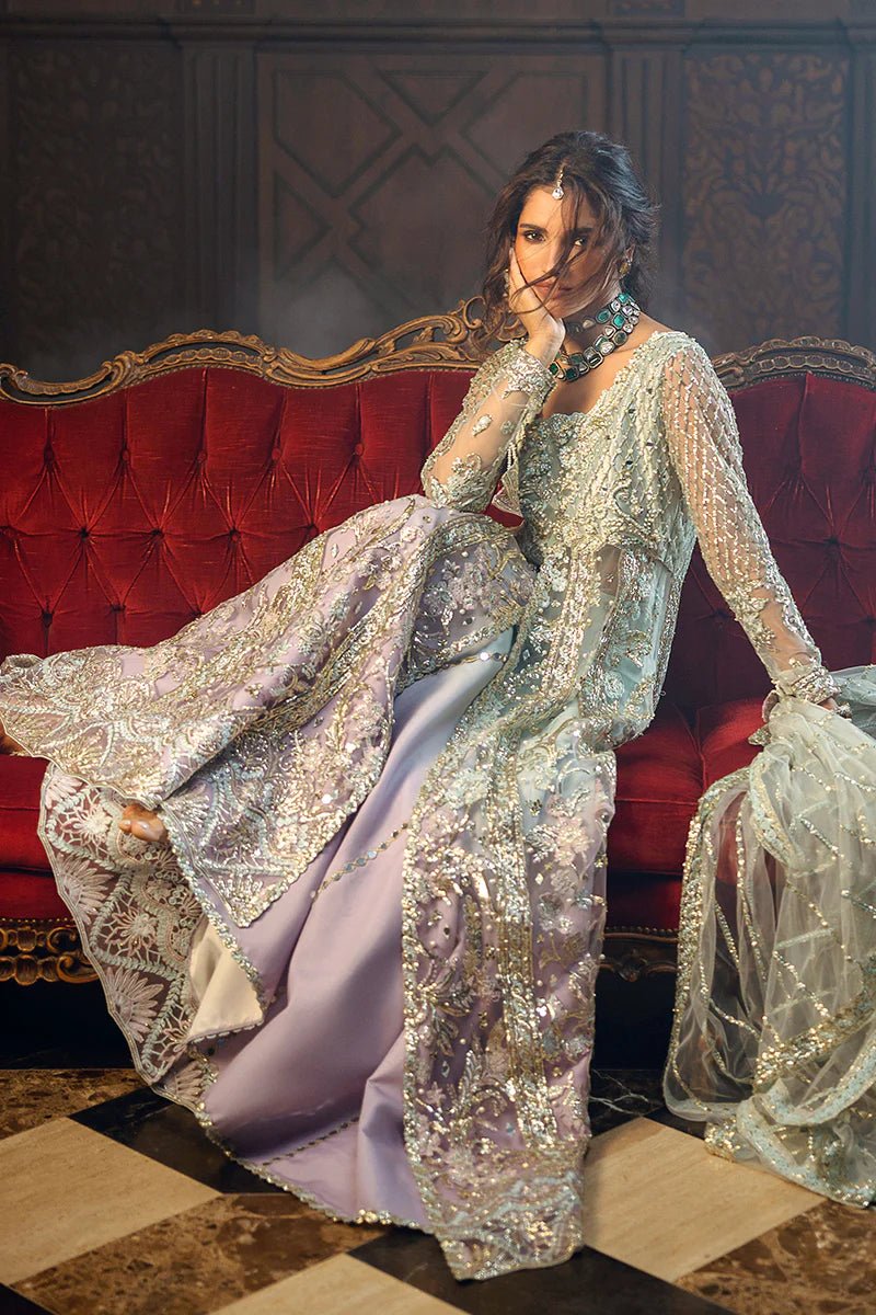 Model wearing Silver Screen from Mushq's Stardust Wedding Collection '24, featuring intricate details and elegant design. Pakistani clothes online in UK.