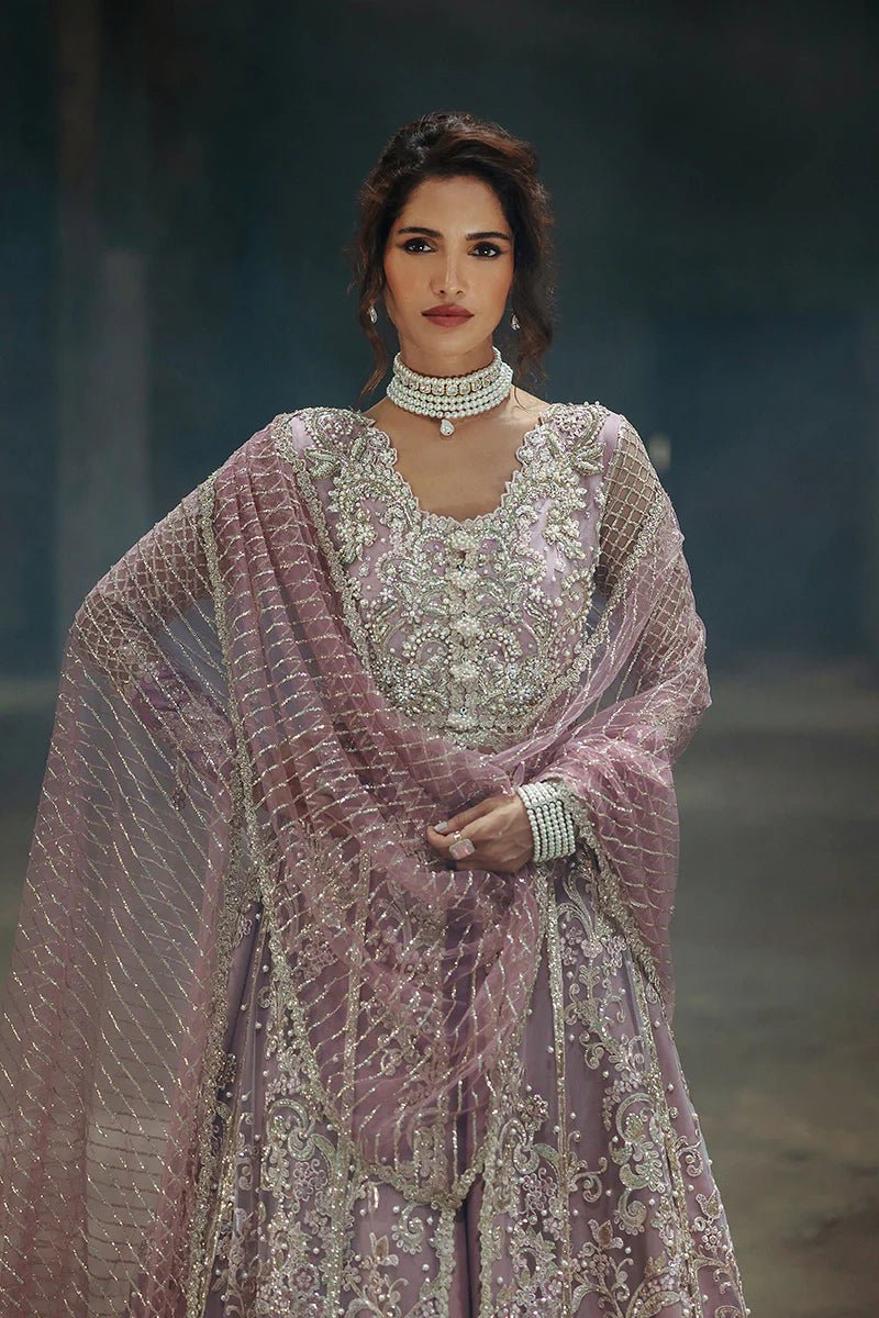 Model wearing Spotlight Dreamer from Mushq's Stardust Wedding Collection '24, showcasing luxurious details. Pakistani clothes online in UK.