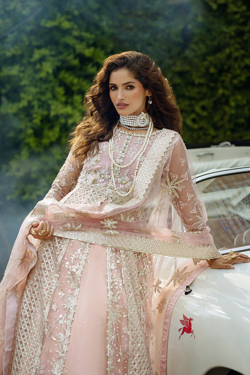 Model wearing Starlet Sparkle from Mushq's Stardust Wedding Collection '24, featuring intricate embellishments. Pakistani clothes online in UK.