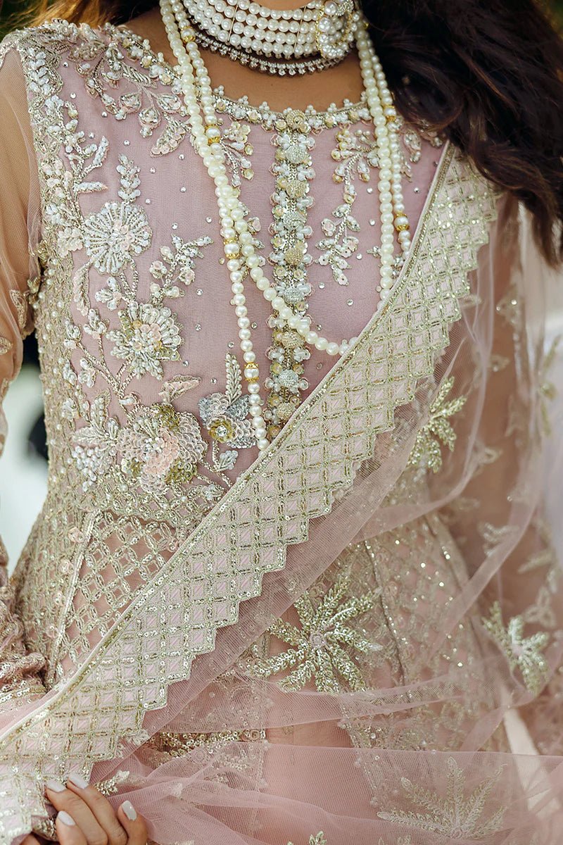 Model wearing Starlet Sparkle from Mushq's Stardust Wedding Collection '24, featuring intricate embellishments. Pakistani clothes online in UK.