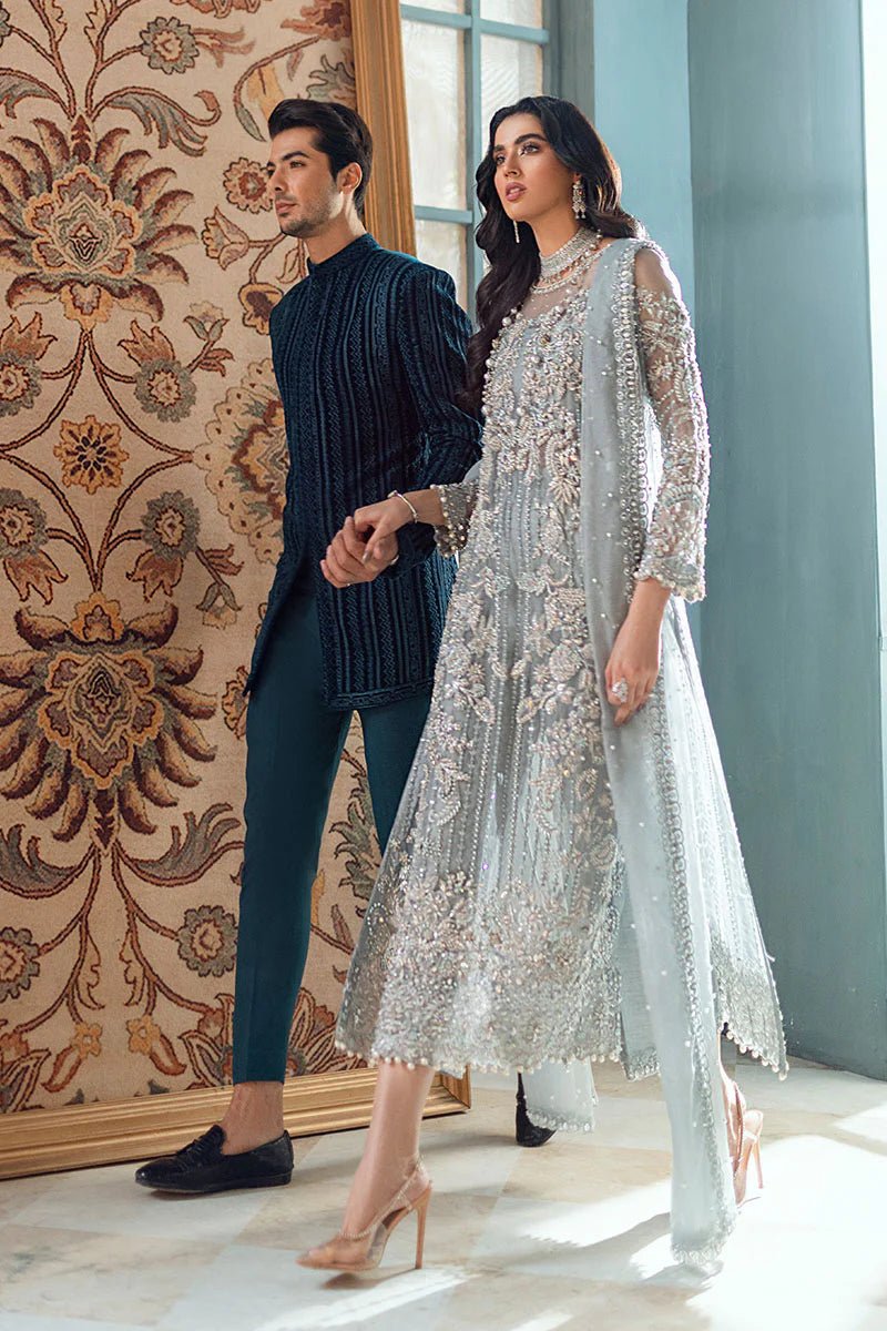 Model wearing Adela dress from Mushq's Tuscany Luxury Formals collection. Pakistani clothes online in UK at Signature Labels.