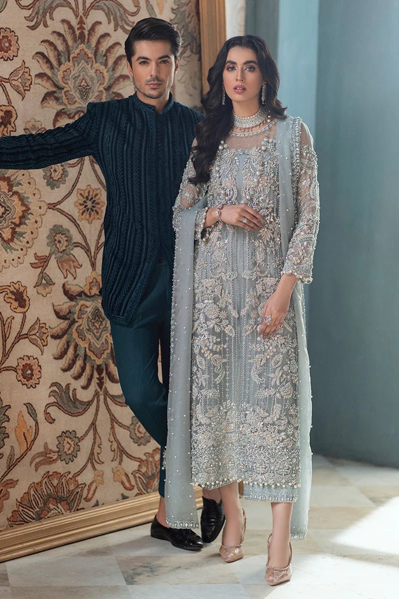 Model wearing Adela dress from Mushq's Tuscany Luxury Formals collection. Pakistani clothes online in UK at Signature Labels.