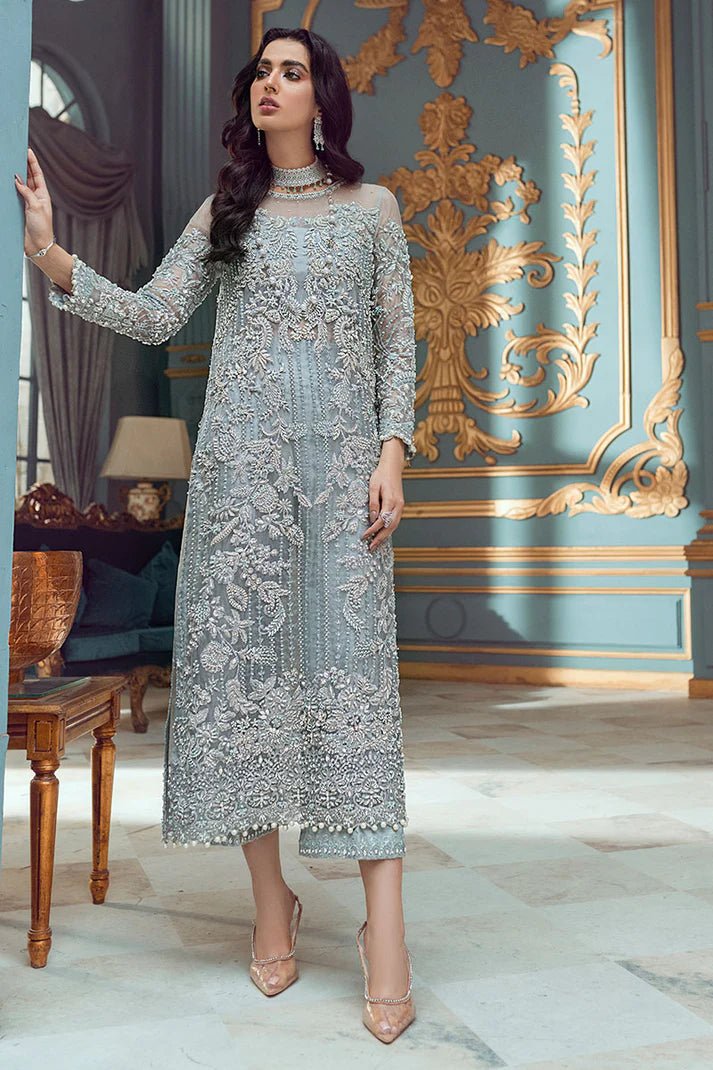 Model wearing Adela dress from Mushq's Tuscany Luxury Formals collection. Pakistani clothes online in UK at Signature Labels.